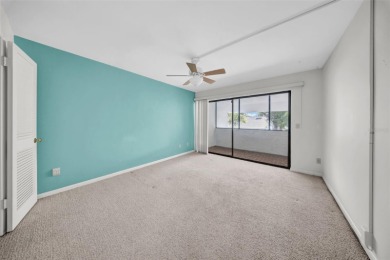 Welcome to this spacious 2-story condo townhouse in the highly on Carrollwood Country Club in Florida - for sale on GolfHomes.com, golf home, golf lot