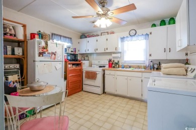 Located just 1,000 feet from the sandy shores of the Atlantic on Whispering Pines in South Carolina - for sale on GolfHomes.com, golf home, golf lot
