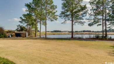 Incredible water and golf course view from this 3BR/2BA golf on Legends Golf Club in South Carolina - for sale on GolfHomes.com, golf home, golf lot