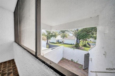 Welcome to this spacious 2-story condo townhouse in the highly on Carrollwood Country Club in Florida - for sale on GolfHomes.com, golf home, golf lot