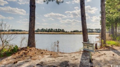 Incredible water and golf course view from this 3BR/2BA golf on Legends Golf Club in South Carolina - for sale on GolfHomes.com, golf home, golf lot