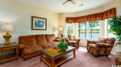 Incredible water and golf course view from this 3BR/2BA golf on Legends Golf Club in South Carolina - for sale on GolfHomes.com, golf home, golf lot