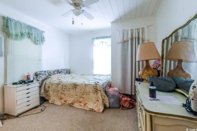 Located just 1,000 feet from the sandy shores of the Atlantic on Whispering Pines in South Carolina - for sale on GolfHomes.com, golf home, golf lot