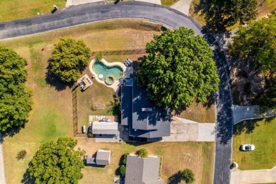 Positioned between holes 12, 17, and 18 of the Lake Kiowa Golf on Lake Kiowa Golf Course in Texas - for sale on GolfHomes.com, golf home, golf lot