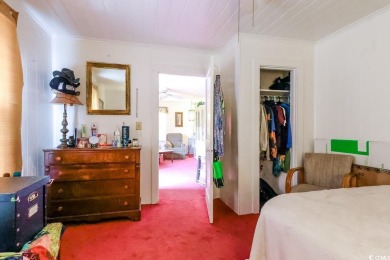 Located just 1,000 feet from the sandy shores of the Atlantic on Whispering Pines in South Carolina - for sale on GolfHomes.com, golf home, golf lot