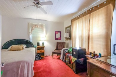 Located just 1,000 feet from the sandy shores of the Atlantic on Whispering Pines in South Carolina - for sale on GolfHomes.com, golf home, golf lot