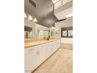 A rare opportunity for luxurious, low-maintenance living in the on Spanish Trail Golf and Country Club in Nevada - for sale on GolfHomes.com, golf home, golf lot