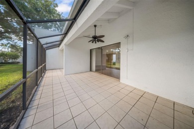 Welcome to this spacious 2-story condo townhouse in the highly on Carrollwood Country Club in Florida - for sale on GolfHomes.com, golf home, golf lot