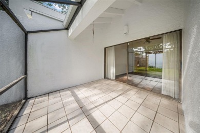 Welcome to this spacious 2-story condo townhouse in the highly on Carrollwood Country Club in Florida - for sale on GolfHomes.com, golf home, golf lot