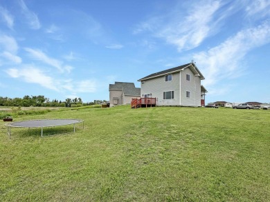 Less time commuting, more time to enjoy home! The warm welcome on Stanley Country Club in North Dakota - for sale on GolfHomes.com, golf home, golf lot