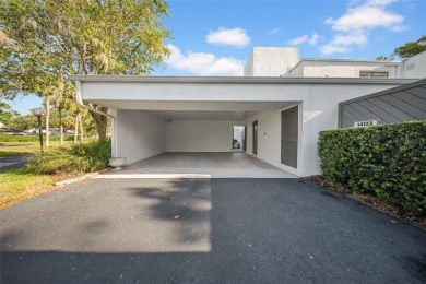 Welcome to this spacious 2-story condo townhouse in the highly on Carrollwood Country Club in Florida - for sale on GolfHomes.com, golf home, golf lot