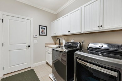 Nestled in the picturesque Regency Lakes section of the Player's on Members Club At St. James Plantation in North Carolina - for sale on GolfHomes.com, golf home, golf lot