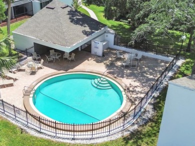 Welcome to this spacious 2-story condo townhouse in the highly on Carrollwood Country Club in Florida - for sale on GolfHomes.com, golf home, golf lot
