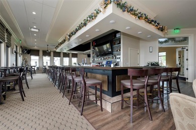 Welcome to 10063 Crooked Creek Dr, Unit 202--a light-filled on Sarasota National Golf Club in Florida - for sale on GolfHomes.com, golf home, golf lot