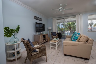 This charming 3-bedroom, 2-bath half-duplex has so much to on Key Colony Beach Golf Course in Florida - for sale on GolfHomes.com, golf home, golf lot