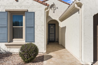 This impeccably maintained residence boasts sophisticated on Tuscany Falls At Pebble Creek in Arizona - for sale on GolfHomes.com, golf home, golf lot