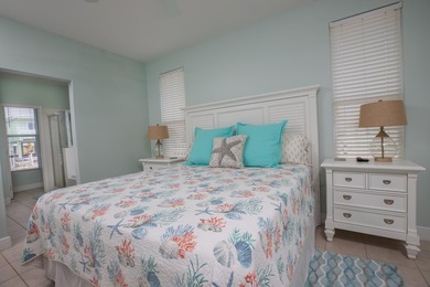 This charming 3-bedroom, 2-bath half-duplex has so much to on Key Colony Beach Golf Course in Florida - for sale on GolfHomes.com, golf home, golf lot