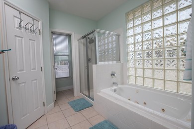 This charming 3-bedroom, 2-bath half-duplex has so much to on Key Colony Beach Golf Course in Florida - for sale on GolfHomes.com, golf home, golf lot