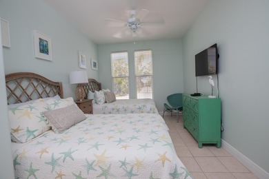 This charming 3-bedroom, 2-bath half-duplex has so much to on Key Colony Beach Golf Course in Florida - for sale on GolfHomes.com, golf home, golf lot