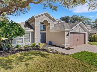 Fall in love with this beautifully updated two-story residence on Ridgewood Lakes Golf and Country Club in Florida - for sale on GolfHomes.com, golf home, golf lot