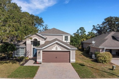 Fall in love with this beautifully updated two-story residence on Ridgewood Lakes Golf and Country Club in Florida - for sale on GolfHomes.com, golf home, golf lot