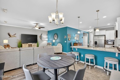 Welcome to this beautifully maintained 3-bedroom, 2-bath coastal on Crow Creek Golf Club in North Carolina - for sale on GolfHomes.com, golf home, golf lot