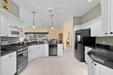 EXQUISITE GARDENIA MODEL |GOLF FRONT! POOL HOME | GOLF CAR on The Links of Spruce Creek in Florida - for sale on GolfHomes.com, golf home, golf lot