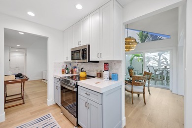 This single story home offers 3 bedrooms, 3.5 baths, 2 car on Jonathans Landing Golf Club in Florida - for sale on GolfHomes.com, golf home, golf lot