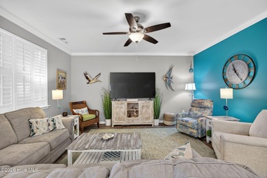 Welcome to this beautifully maintained 3-bedroom, 2-bath coastal on Crow Creek Golf Club in North Carolina - for sale on GolfHomes.com, golf home, golf lot