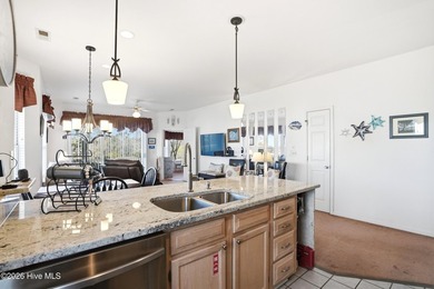 Discover the perfect blend of comfort, flexibility, and coastal on Sea Trail Golf Resort in North Carolina - for sale on GolfHomes.com, golf home, golf lot