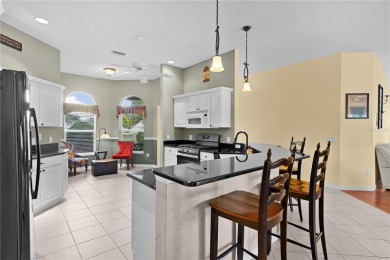 EXQUISITE GARDENIA MODEL |GOLF FRONT! POOL HOME | GOLF CAR on The Links of Spruce Creek in Florida - for sale on GolfHomes.com, golf home, golf lot