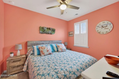 Welcome to this beautifully maintained 3-bedroom, 2-bath coastal on Crow Creek Golf Club in North Carolina - for sale on GolfHomes.com, golf home, golf lot