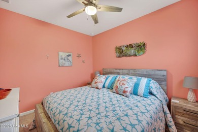 Welcome to this beautifully maintained 3-bedroom, 2-bath coastal on Crow Creek Golf Club in North Carolina - for sale on GolfHomes.com, golf home, golf lot