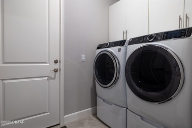 Better than new and beautifully upgraded! This exceptional on Plantation Bay Golf and Country Club in Florida - for sale on GolfHomes.com, golf home, golf lot