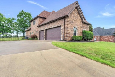 Stunning updated executive home with sunroom and screened porch on Sage Meadows Golf Course in Arkansas - for sale on GolfHomes.com, golf home, golf lot