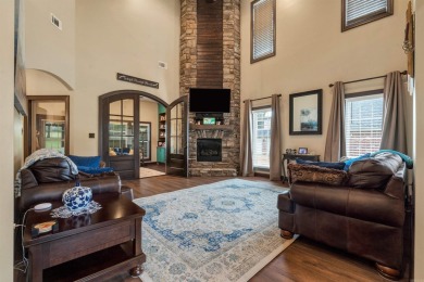 Stunning updated executive home with sunroom and screened porch on Sage Meadows Golf Course in Arkansas - for sale on GolfHomes.com, golf home, golf lot