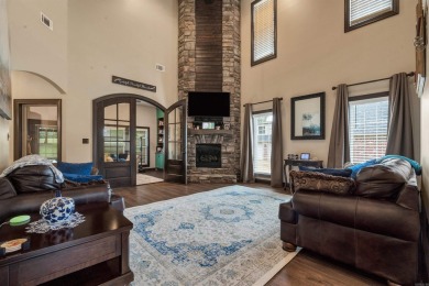 Stunning updated executive home with sunroom and screened porch on Sage Meadows Golf Course in Arkansas - for sale on GolfHomes.com, golf home, golf lot