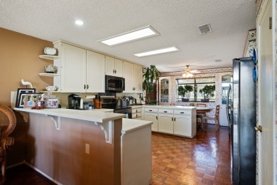 Welcome to this beautifully appointed one-story townhome located on Riverhill Country Club in Texas - for sale on GolfHomes.com, golf home, golf lot