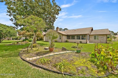 This charming and well-maintained 3/2/2 home sits in the quiet on Plantation Bay Golf and Country Club in Florida - for sale on GolfHomes.com, golf home, golf lot