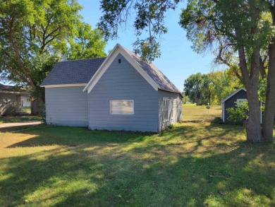 Looking for an investment property or single family home?  This on Akron Golf Course in Iowa - for sale on GolfHomes.com, golf home, golf lot