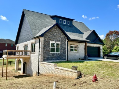 Discover your future haven in this gorgeous new construction on Somerset Country Club in Kentucky - for sale on GolfHomes.com, golf home, golf lot