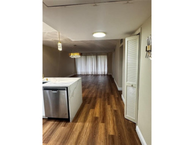 Step into luxury with this beautifully 2/2 condo located in the on Palm-Aire Country Club and Resort - Palms in Florida - for sale on GolfHomes.com, golf home, golf lot
