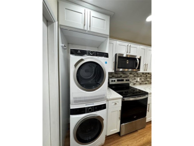 Step into luxury with this beautifully 2/2 condo located in the on Palm-Aire Country Club and Resort - Palms in Florida - for sale on GolfHomes.com, golf home, golf lot