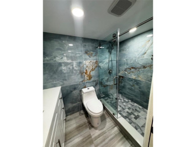 Step into luxury with this beautifully 2/2 condo located in the on Palm-Aire Country Club and Resort - Palms in Florida - for sale on GolfHomes.com, golf home, golf lot