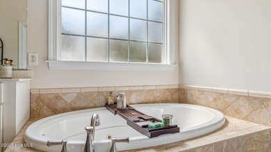 Welcome to this stunning 4-bedroom, 2.5-bathroom home, nestled on Pinehurst Resort and Country Club in North Carolina - for sale on GolfHomes.com, golf home, golf lot