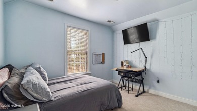 Welcome to this stunning 4-bedroom, 2.5-bathroom home, nestled on Pinehurst Resort and Country Club in North Carolina - for sale on GolfHomes.com, golf home, golf lot