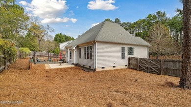 Welcome to this stunning 4-bedroom, 2.5-bathroom home, nestled on Pinehurst Resort and Country Club in North Carolina - for sale on GolfHomes.com, golf home, golf lot
