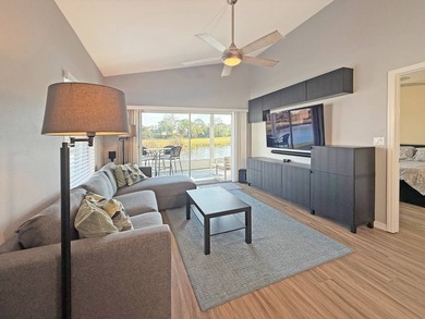 Beautifully renovated villa with golf course and lake views! on The Great Outdoors Golf and Country Club in Florida - for sale on GolfHomes.com, golf home, golf lot