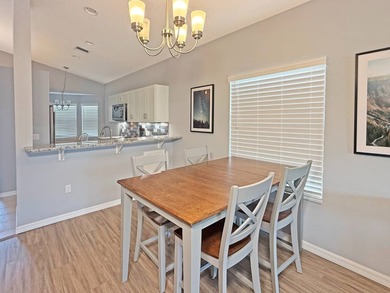 Beautifully renovated villa with golf course and lake views! on The Great Outdoors Golf and Country Club in Florida - for sale on GolfHomes.com, golf home, golf lot