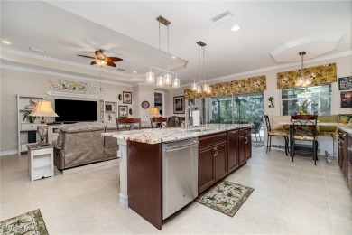 This stunning 4-bedroom plus den home is a rare find, offering on Herons Glen Golf and Country Club in Florida - for sale on GolfHomes.com, golf home, golf lot